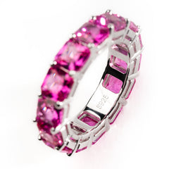 Tennis ring with pink gemstones